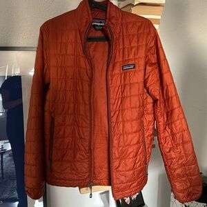Patagonia down jacket in orange